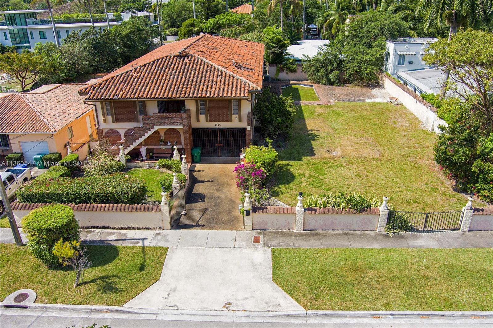 30 Southwest 21st Road Miami, FL 33129 - Photo 6 of 30 a front view of a house with garden