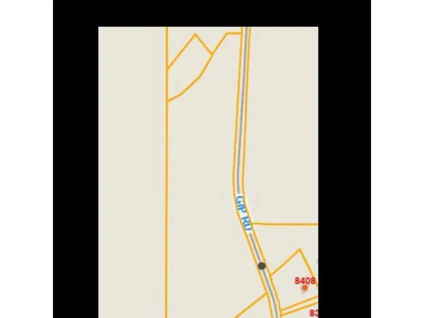 a picture of a bathroom with a door