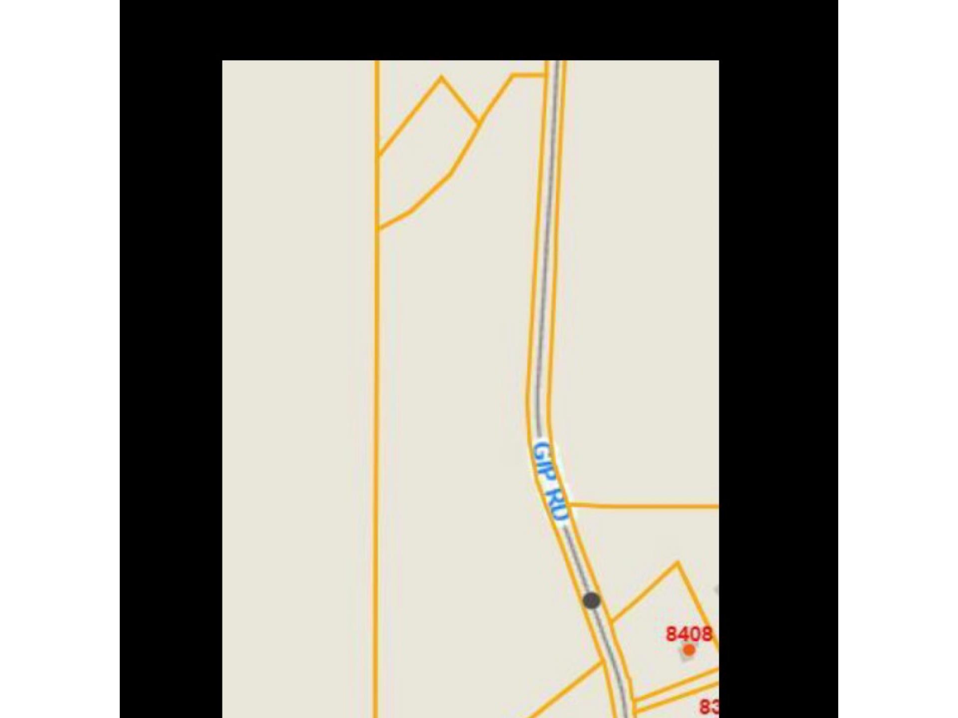 a picture of a bathroom with a door