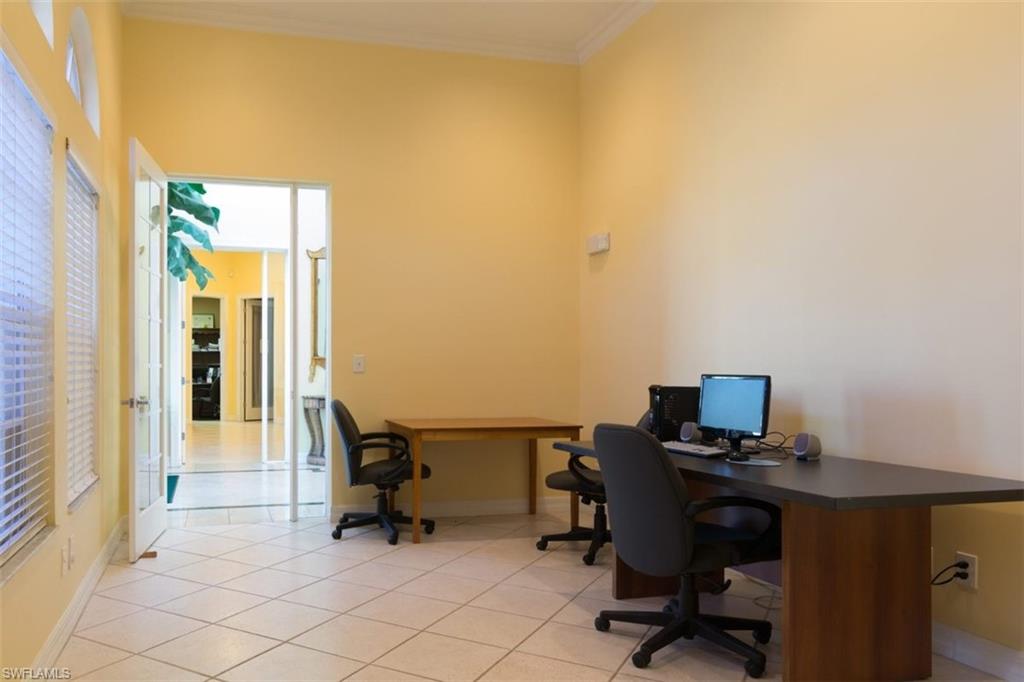 4635 St Croix Lane, Unit 1218 Naples, FL 34109 - Photo 36 of 40 Home office featuring ornamental molding and light tile patterned flooring