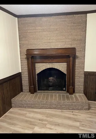 a view of a livingroom with a fireplace