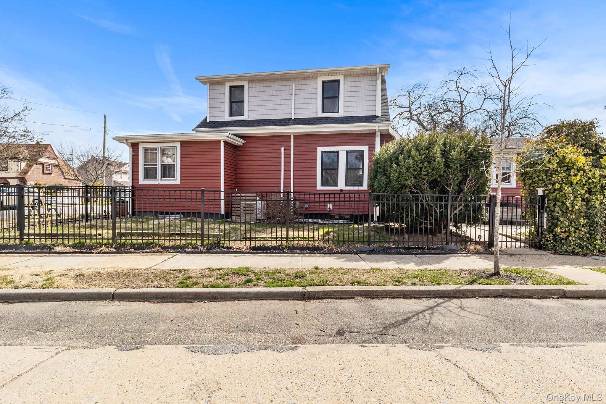 42 Robertson Road Lynbrook, NY 11563 - Photo 22 of 23 a front view of a house