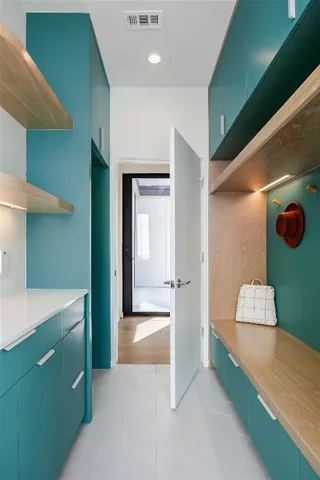 a en suite bathroom with a sink and a mirror