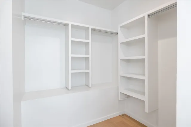 a view of an empty walk in closet