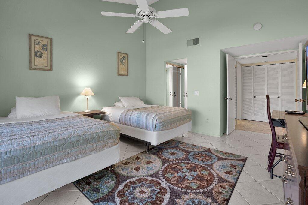 41071 Preston Trail Palm Desert, CA 92211 - Photo 11 of 29 a bedroom with a bed and a mirror