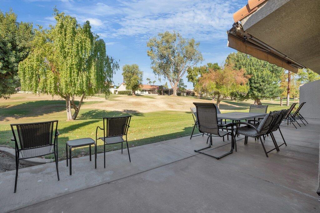 41071 Preston Trail Palm Desert, CA 92211 - Photo 14 of 29 a view of a swimming pool with outdoor seating