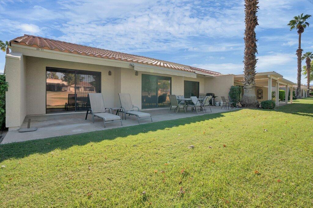 41071 Preston Trail Palm Desert, CA 92211 - Photo 16 of 29 a view of a house with swimming pool and sitting area