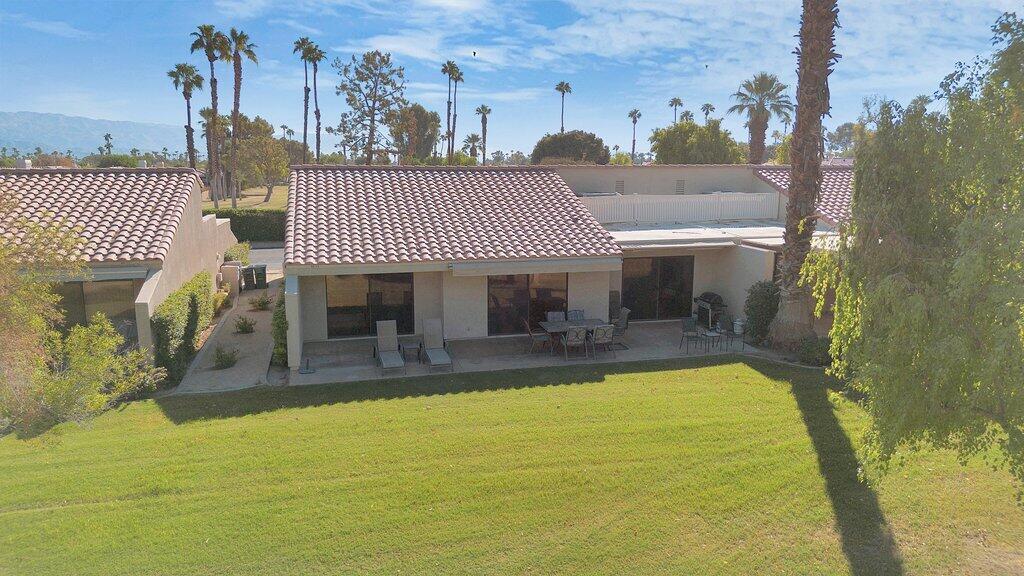 41071 Preston Trail Palm Desert, CA 92211 - Photo 20 of 29 a view of a patio with swimming pool