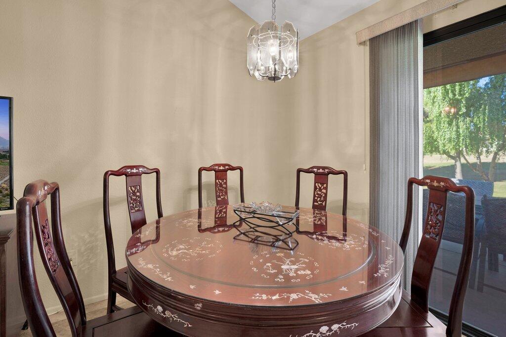 41071 Preston Trail Palm Desert, CA 92211 - Photo 5 of 29 a dining room with furniture and window