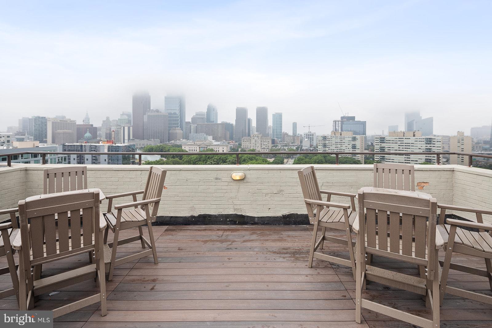 2201 Pennsylvania Avenue, Unit 908 Philadelphia, PA 19130 - Photo 34 of 45 a view of a terrace with wooden benches