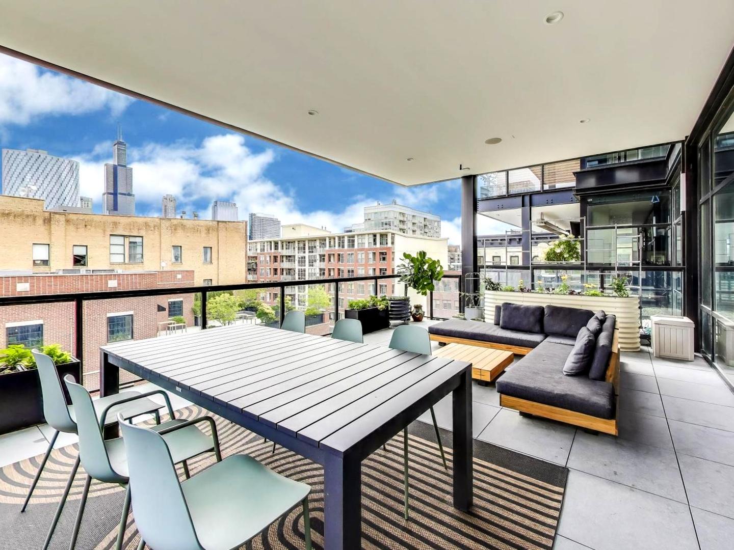 6 North Carpenter Street, Unit 5B Chicago, IL 60607 - Photo 34 of 40 a outdoor space with furniture and a potted plant