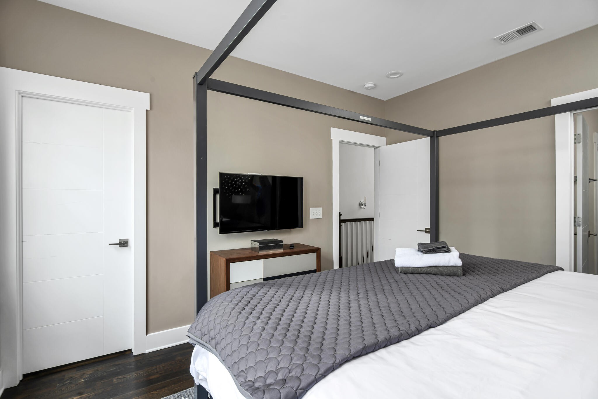 601 Ries Avenue Nashville, TN 37209 - Photo 20 of 30 a bedroom with a bed and a flat screen tv