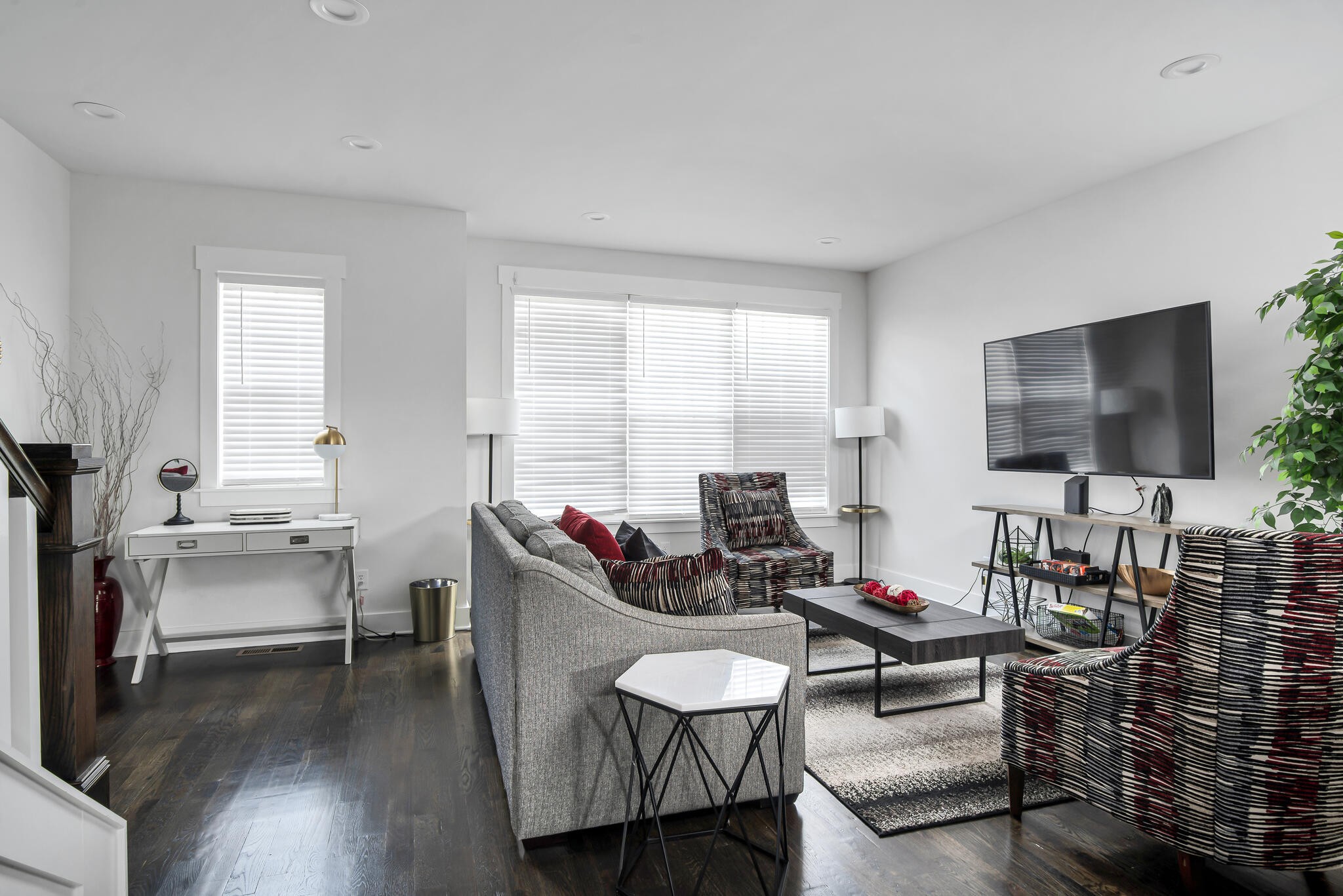 601 Ries Avenue Nashville, TN 37209 - Photo 24 of 30 a living room with furniture a flat screen tv and wooden floor