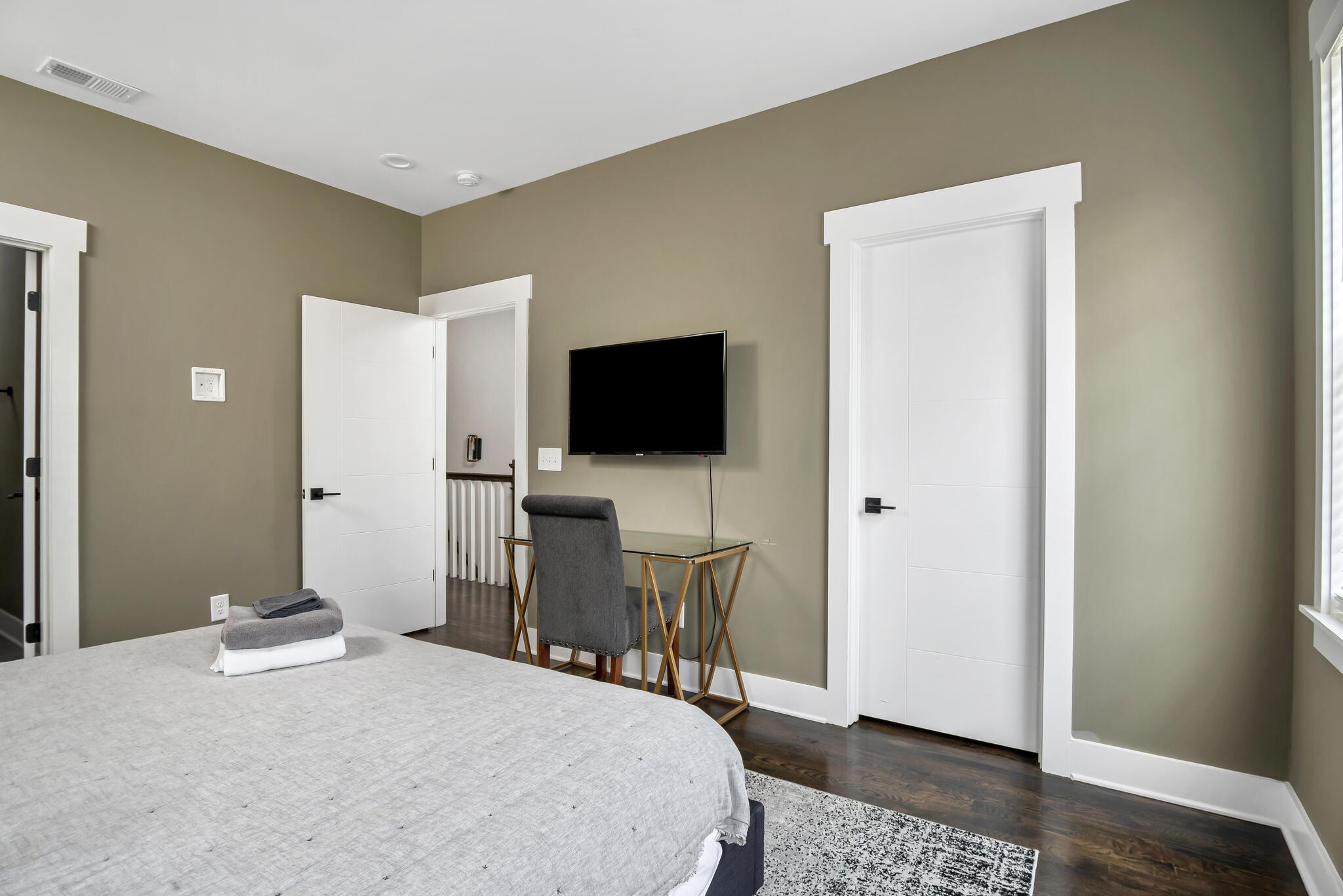 601 Ries Avenue Nashville, TN 37209 - Photo 28 of 30 a bedroom with a bed and a flat screen tv