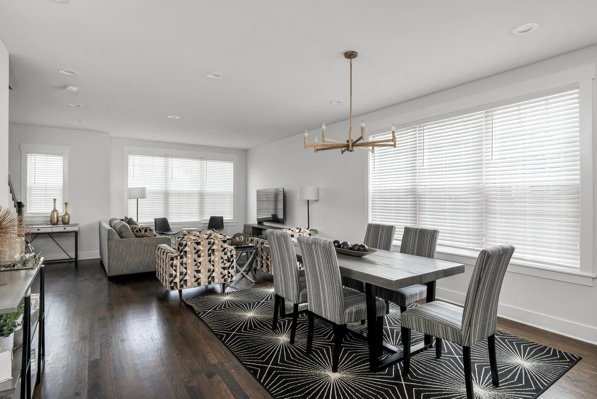 601 Ries Avenue Nashville, TN 37209 - Photo 4 of 30 a view of a livingroom and dining room with furniture window and wooden floor