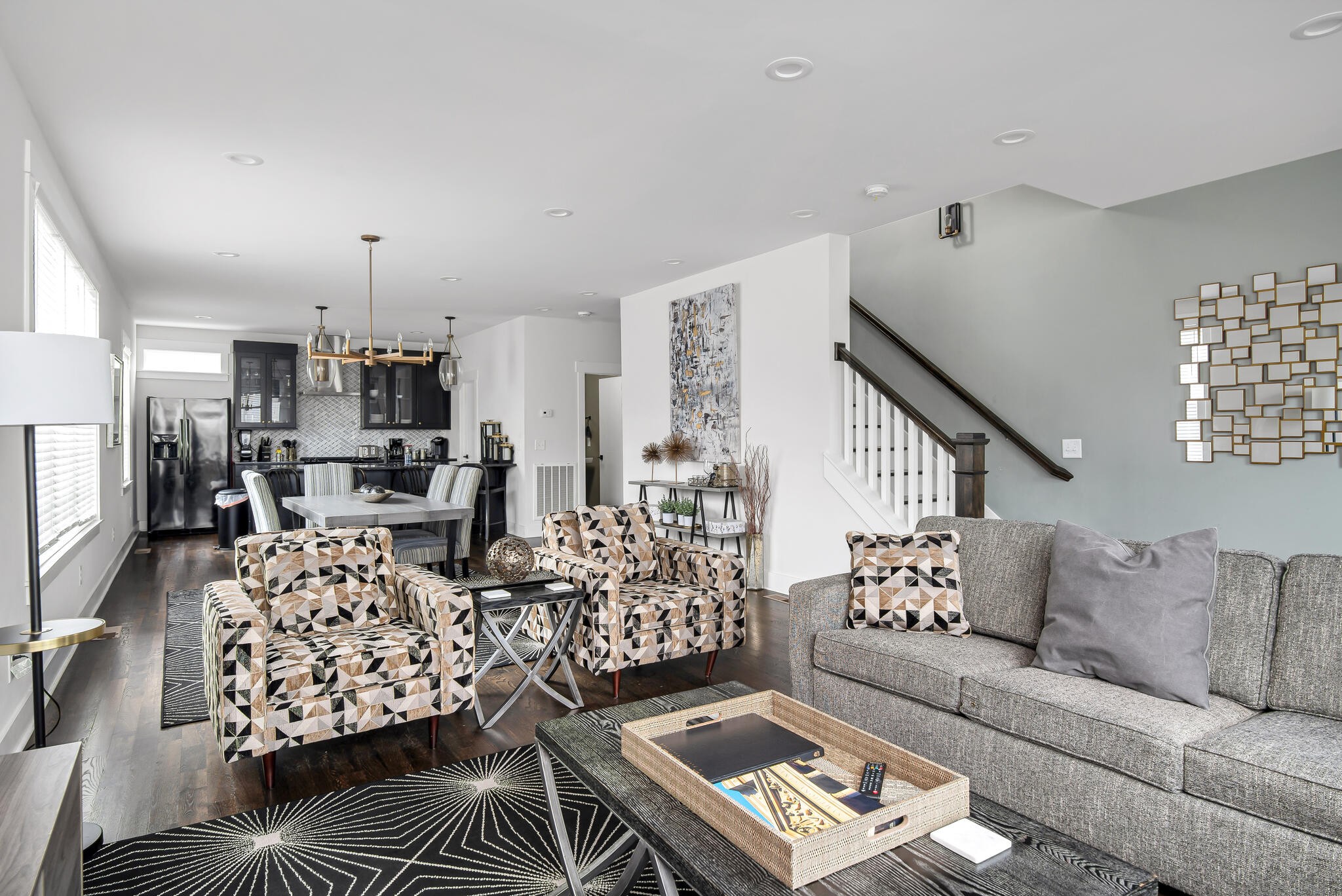 601 Ries Avenue Nashville, TN 37209 - Photo 5 of 30 a living room with furniture and a chandelier