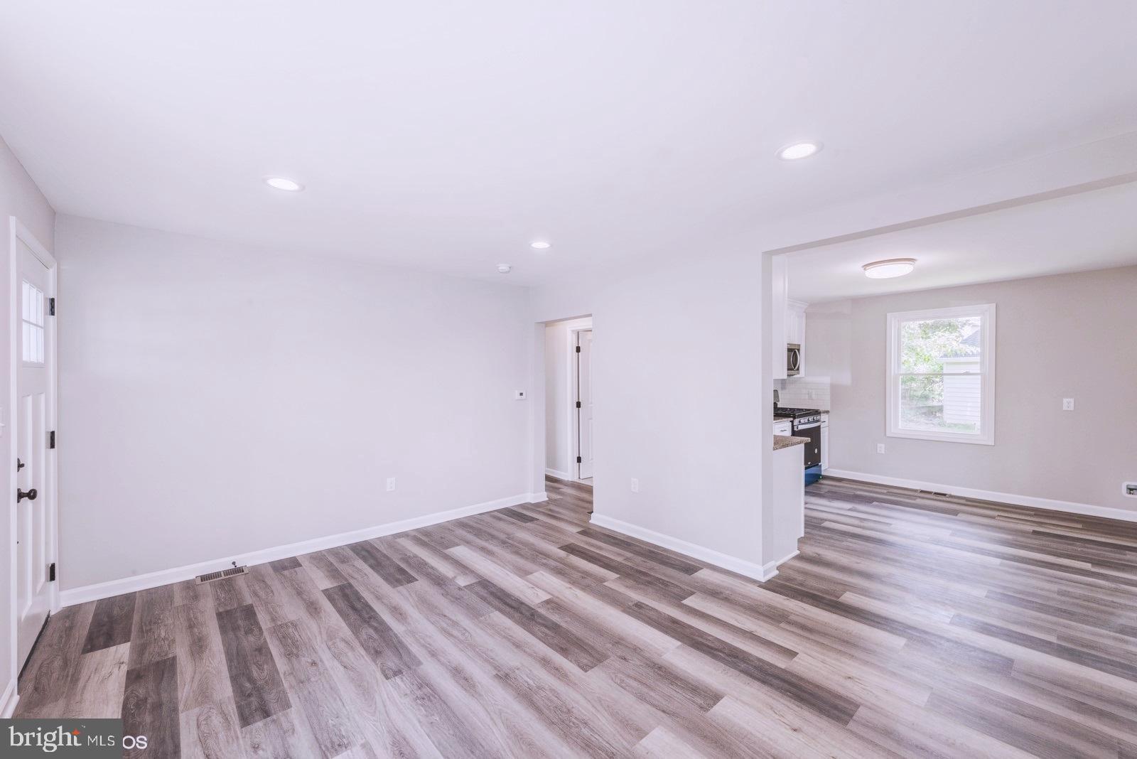 111 Alcock Road Essex, MD 21221 - Photo 8 of 18 Dining Room with LVP Floors