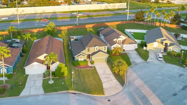 a view of a swimming pool with a patio