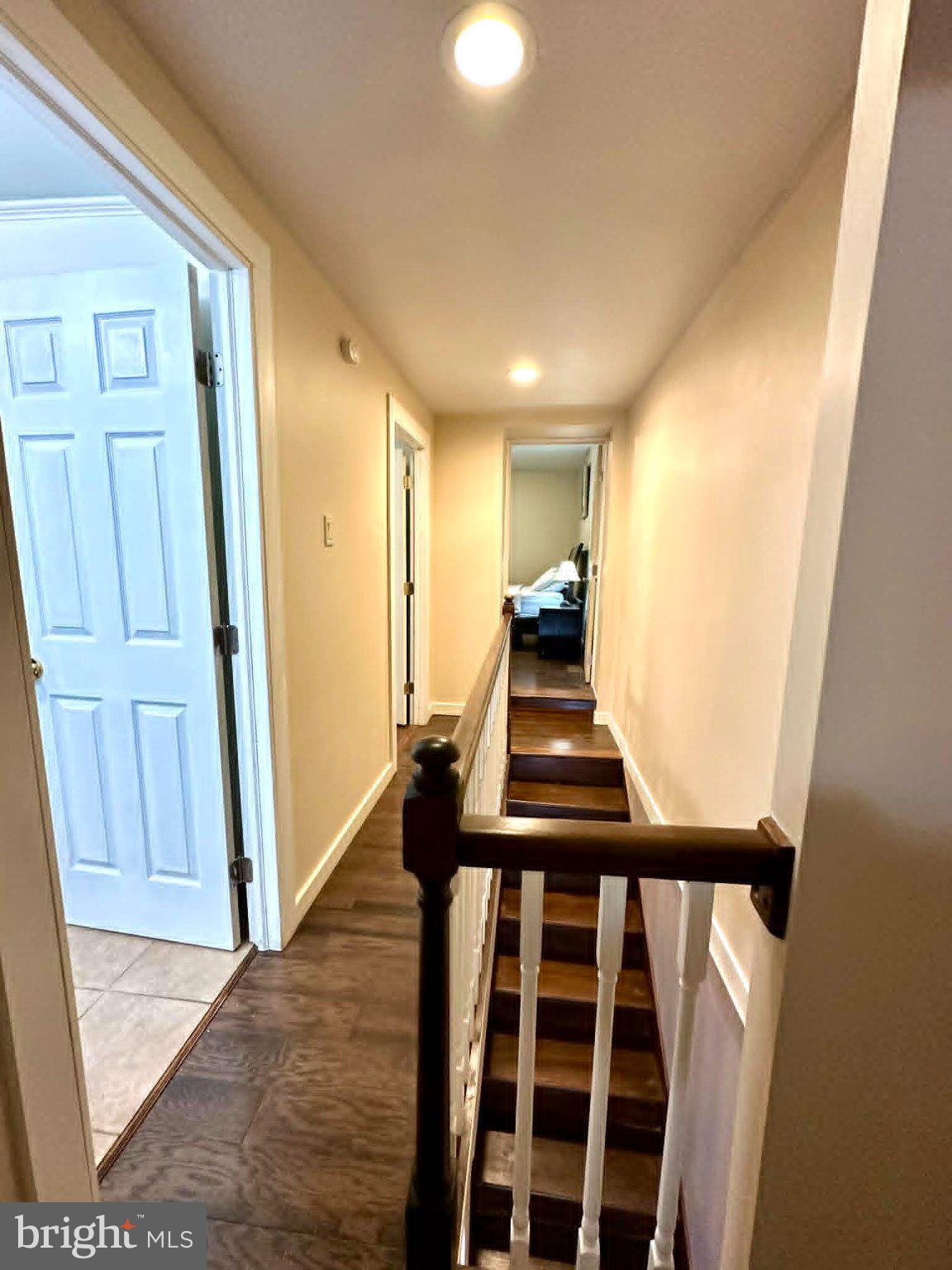 1209 Peters Street Philadelphia, PA 19147 - Photo 11 of 13 Inviting hallway with warm lighting.