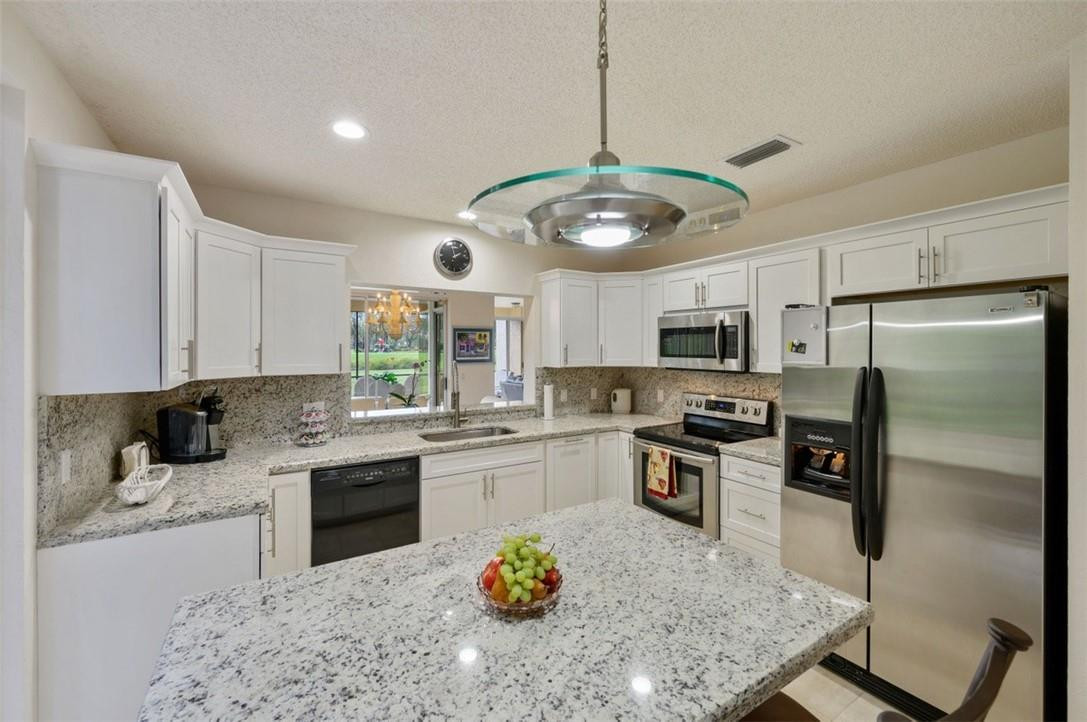 5887 Northwest 24th Avenue, Unit 1201 Boca Raton, FL 33496 - Photo 11 of 47 KITCHEN