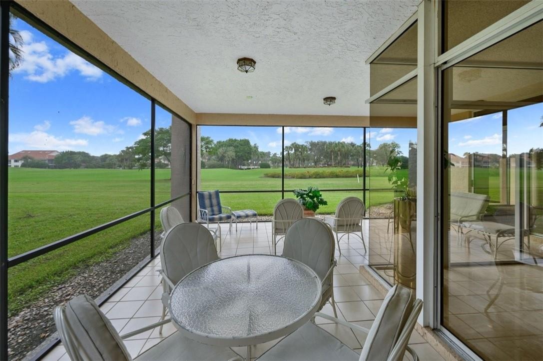 5887 Northwest 24th Avenue, Unit 1201 Boca Raton, FL 33496 - Photo 20 of 47 SCREENED PORCH