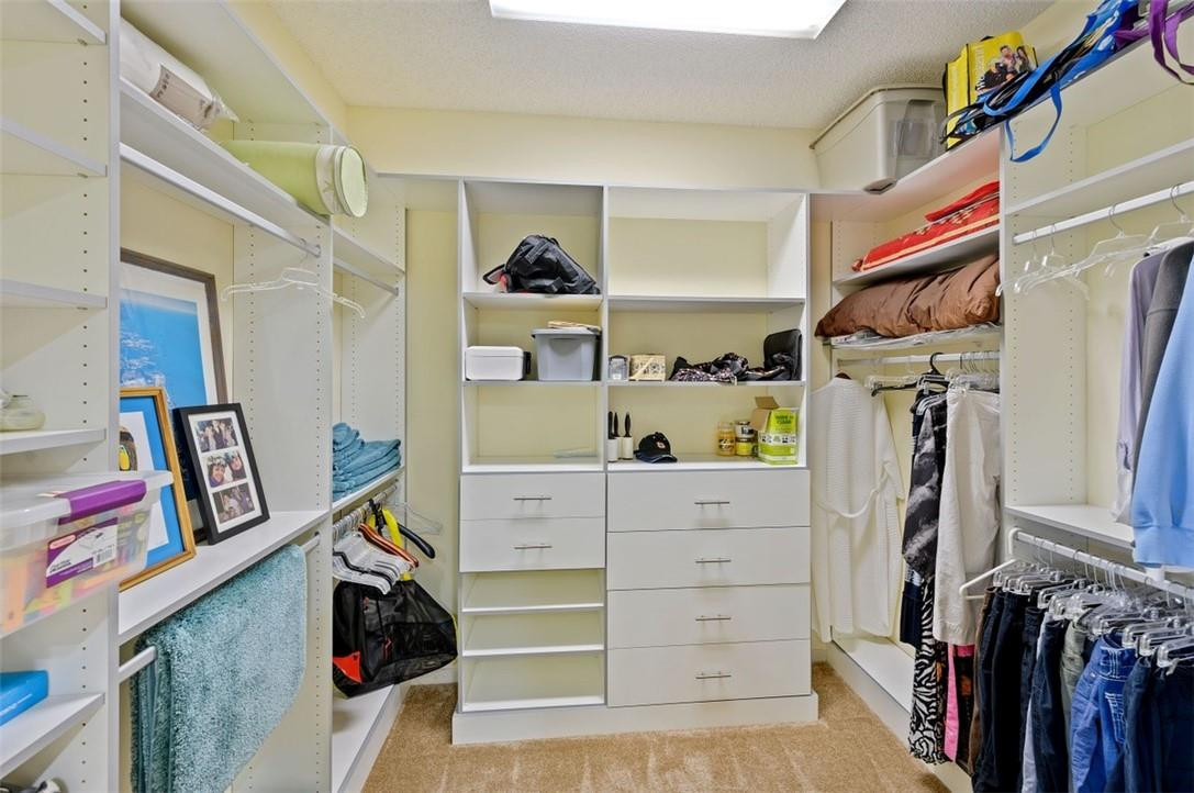 5887 Northwest 24th Avenue, Unit 1201 Boca Raton, FL 33496 - Photo 28 of 47 Master Walk in closet