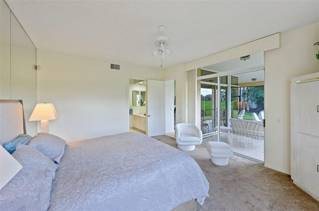 5887 Northwest 24th Avenue, Unit 1201 Boca Raton, FL 33496 - Photo 30 of 47 Master looking out to porch