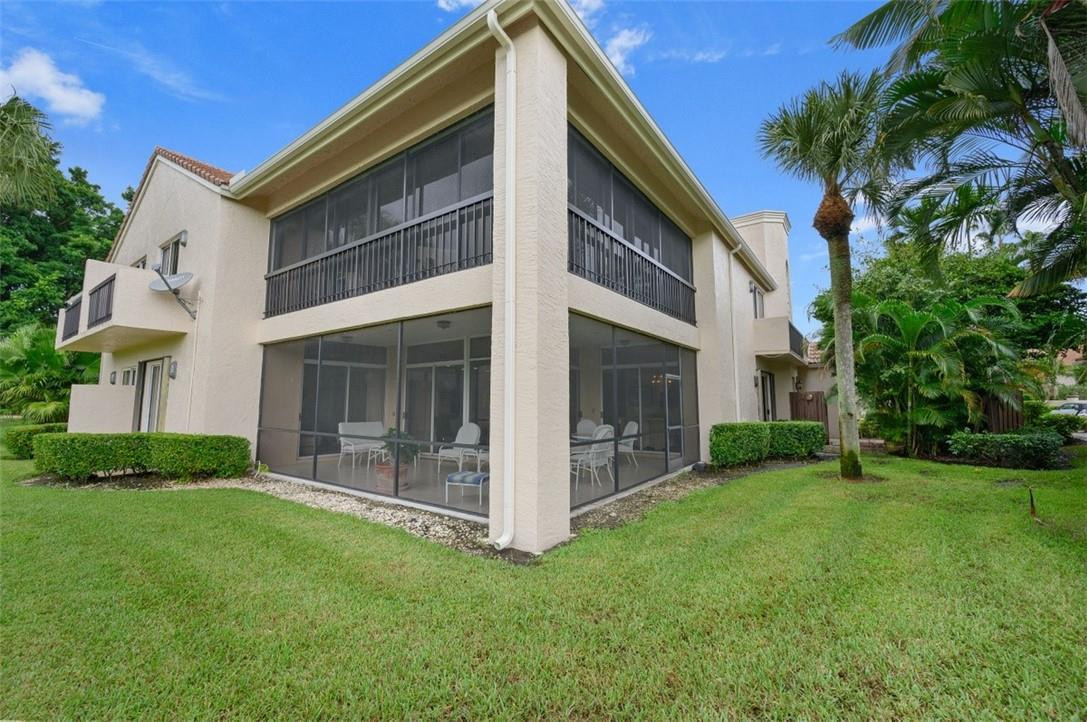 5887 Northwest 24th Avenue, Unit 1201 Boca Raton, FL 33496 - Photo 3 of 47 PORCH FROM YARD