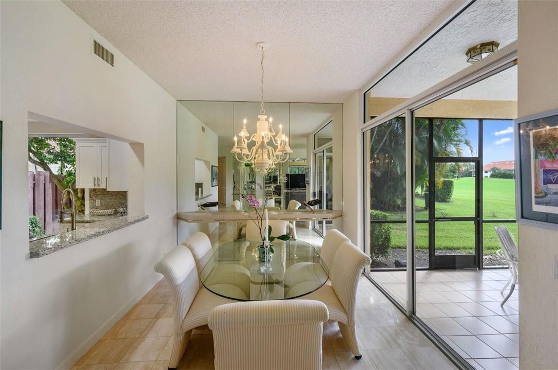 5887 Northwest 24th Avenue, Unit 1201 Boca Raton, FL 33496 - Photo 7 of 47 DINING ROOM WITH PASS THROUGH