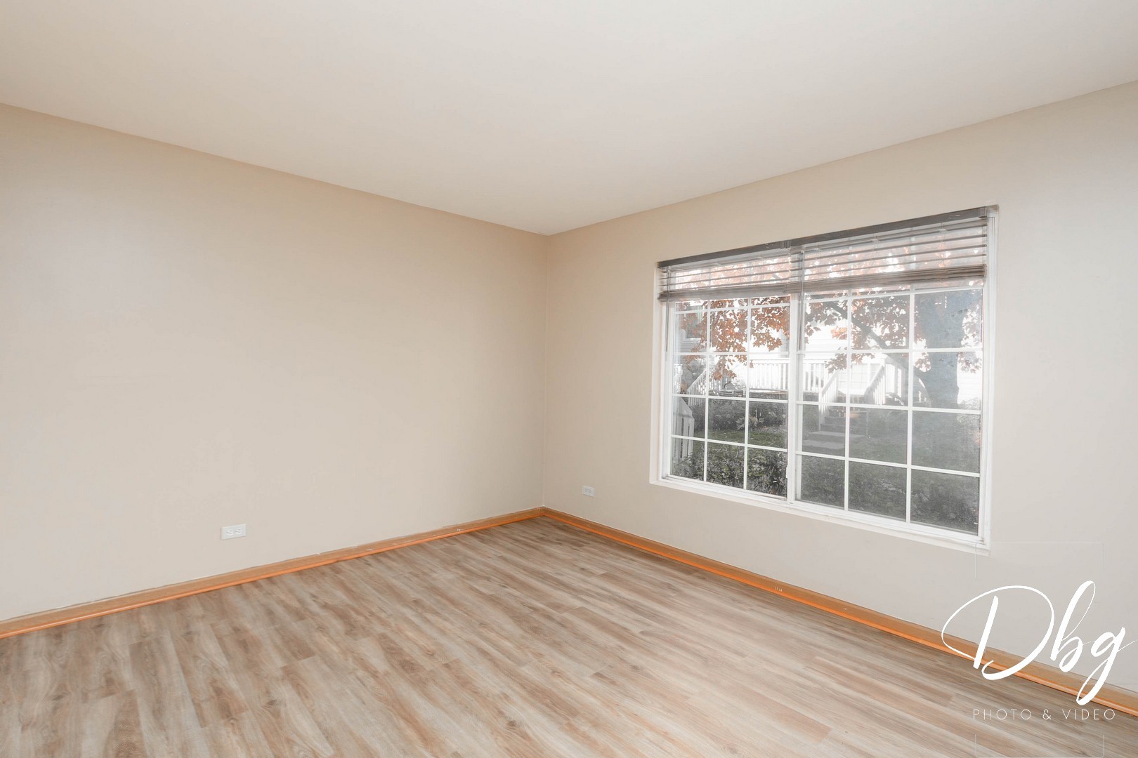 31 South Treehouse Lane, Unit 31 Round Lake, IL 60073 - Photo 15 of 26 a view of empty room with wooden floor and fan