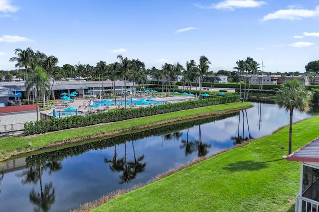 a view of a balcony with potted plants