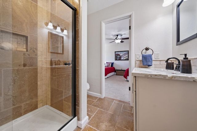 a en suite bathroom with a double vanity sink