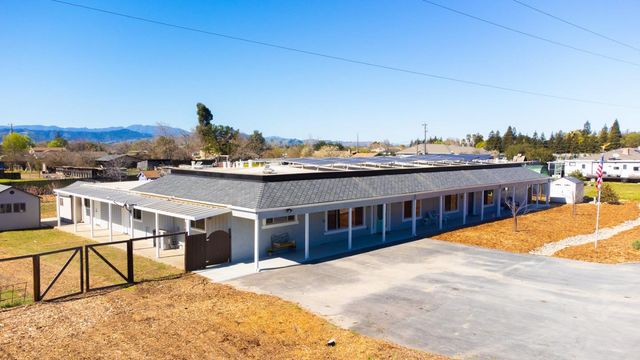 a view of a terrace with sitting area