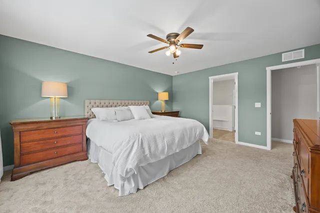 a bathroom with a double vanity sink mirror double and shower