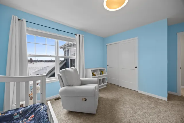 a bathroom with a toilet a sink a tub and mirror