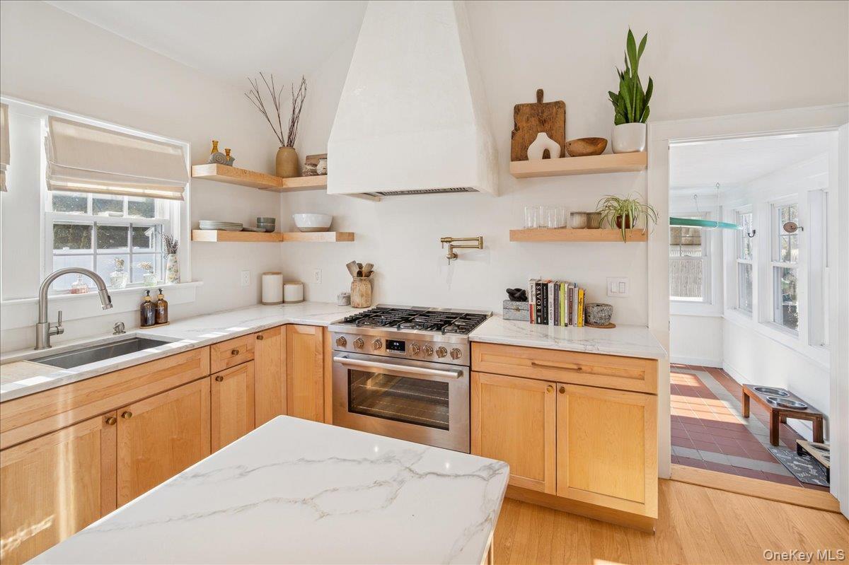 36 Atlantic Avenue Blue Point, NY 11715 - Photo 11 of 46 Access to tiled floor mud room from kitchen