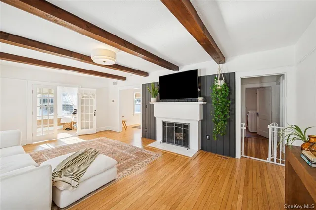 a living room with furniture and a rug