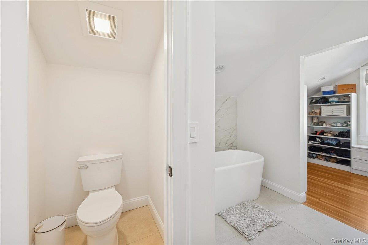 36 Atlantic Avenue Blue Point, NY 11715 - Photo 33 of 46 Primary bedroom with private lavatory