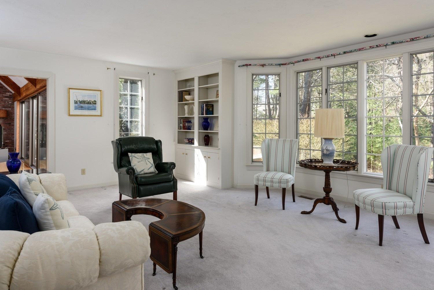 25 Oakdale Path Osterville, MA 02655 - Photo 14 of 21 a living room with furniture and floor to ceiling windows