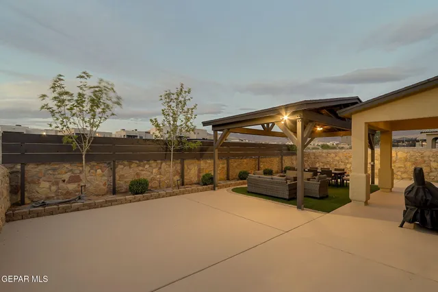 a bed room with a bed and a chandelier