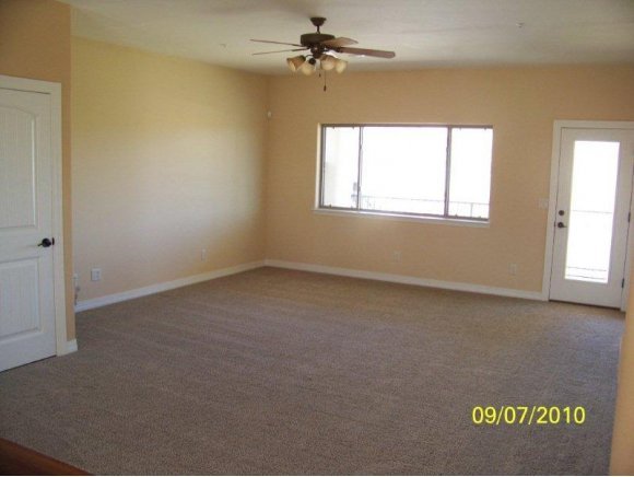 3680 West L Bar L Road Prescott, AZ 86305 - Photo 15 of 24 an empty room with windows and fan