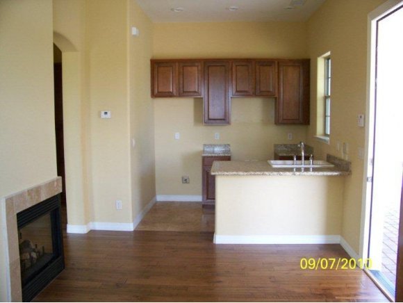 3680 West L Bar L Road Prescott, AZ 86305 - Photo 18 of 24 a room with a sink a microwave and cabinets