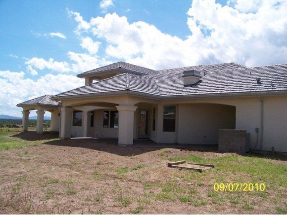 3680 West L Bar L Road Prescott, AZ 86305 - Photo 20 of 24 a view of a house with a yard