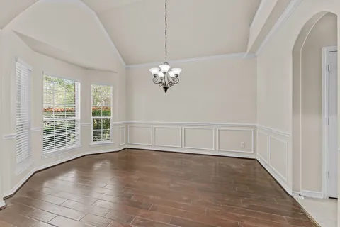 a view of a livingroom with furniture and a fireplace
