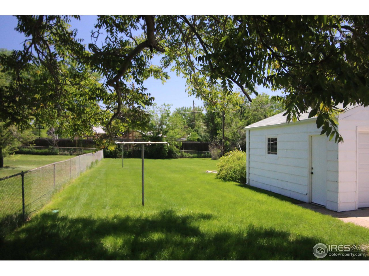 7702 Raleigh Street Westminster, CO 80030 - Photo 4 of 14 BACK YARD TO EAST