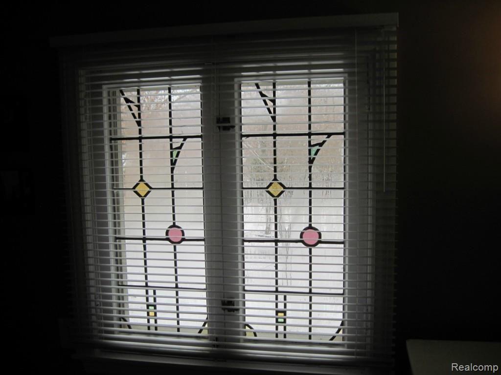1053 Audubon Road Grosse Pointe, MI 48230 - Photo 14 of 27 Stained glass window in Master Bath