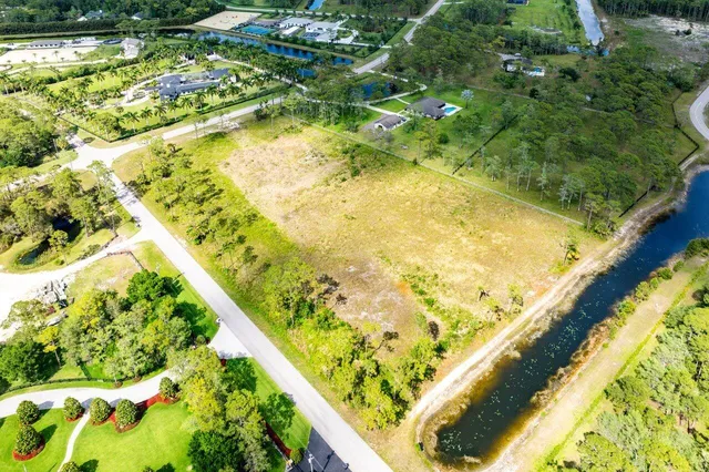 a view of swimming pool from a lake view