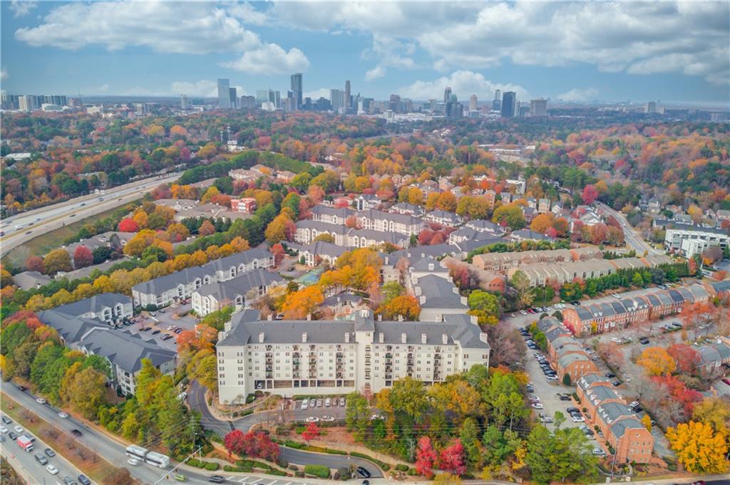 970 Sidney Marcus Boulevard Northeast, Unit 2403 Atlanta, GA 30324 - Photo 2 of 41 an aerial view of residential building and street
