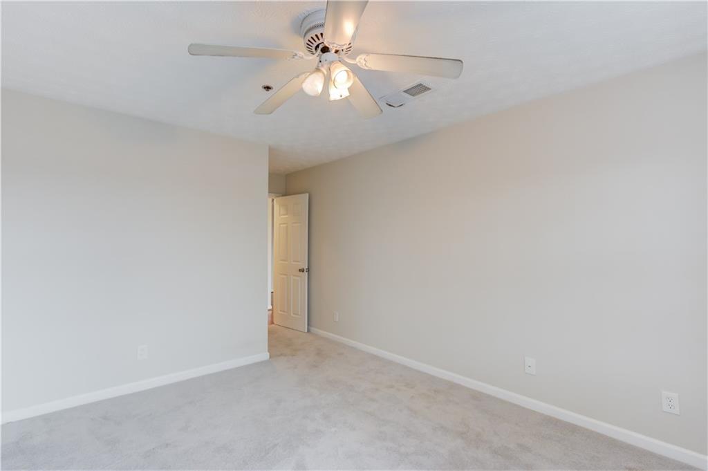 970 Sidney Marcus Boulevard Northeast, Unit 2403 Atlanta, GA 30324 - Photo 21 of 41 a view of an empty room