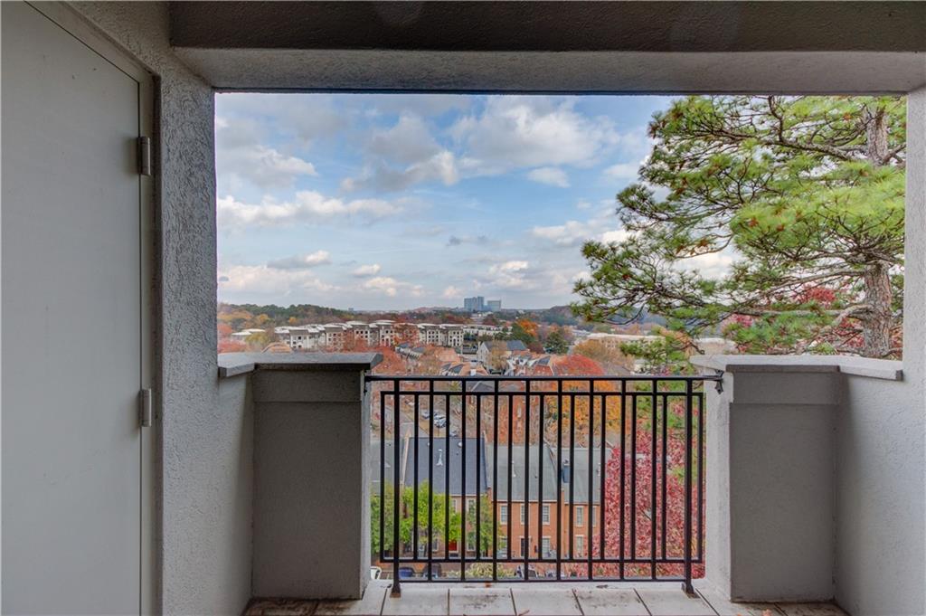 970 Sidney Marcus Boulevard Northeast, Unit 2403 Atlanta, GA 30324 - Photo 25 of 41 a view of a balcony with an outdoor space